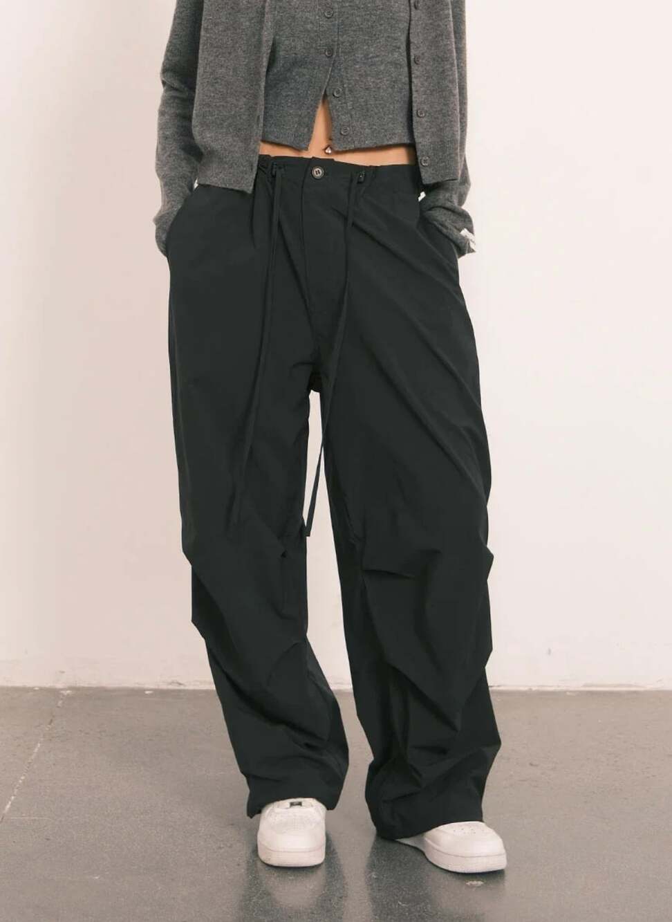 An Action a day parachute pants in deep gray Medium